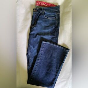 Cookie Johnson jeans size 30 bootcut medium blue wash in like new condition.